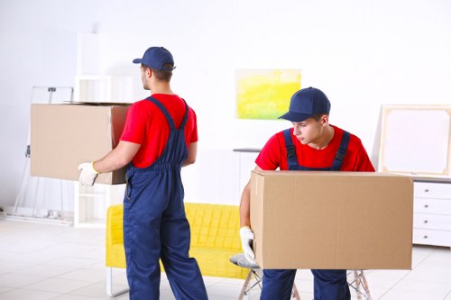Flat removals planning in Manorpark with moving boxes and packed apartment items