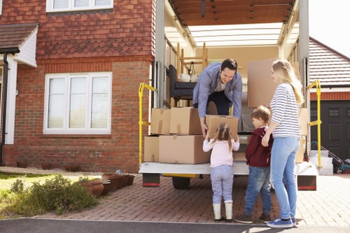 Man With Van Manorpark moving service loading items into a van