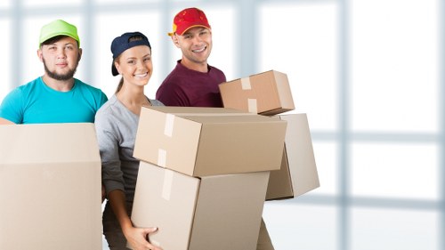 Professional moving team completing a safe and organised van loading process