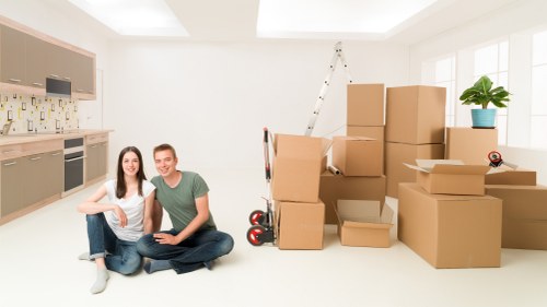 Small removals van handling a flat move in Manor Park