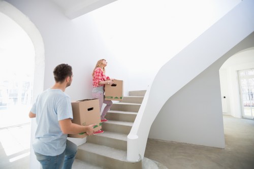 Loading household furniture and boxes into a removals van