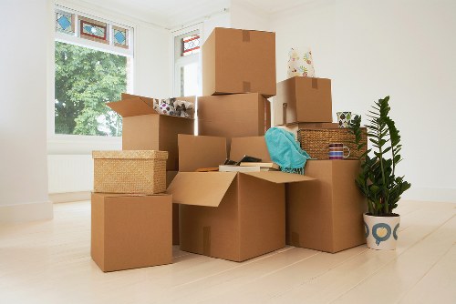 Boxes and furniture loaded into a removal truck for local moving service