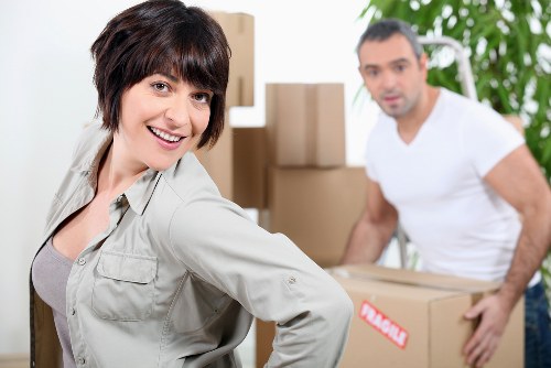 Professional moving truck service in Manorpark loading boxes