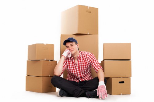 Careful lifting and handling of household belongings during a move